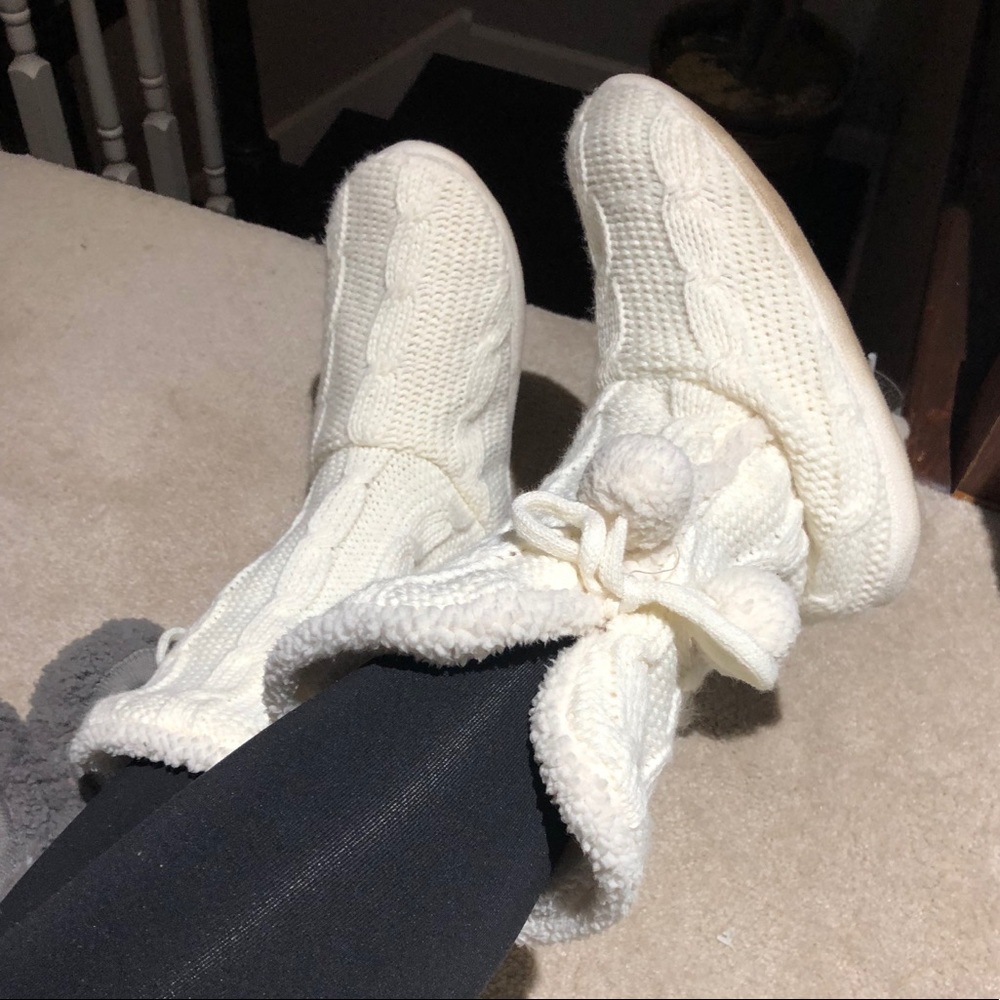 Cream sweater socks with suede bottom and pom poms